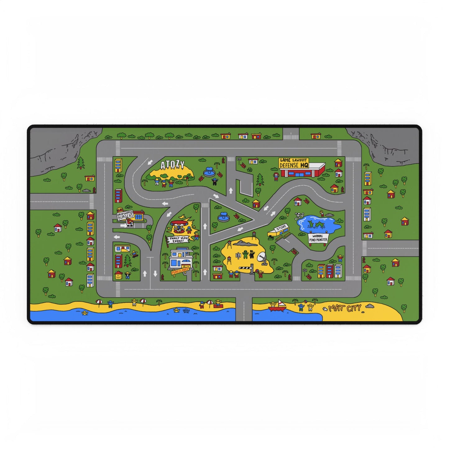 A detailed view of the large Atozy Mouse Pad with roads, colorful landmarks, and the "Atozy" sign on a hill.