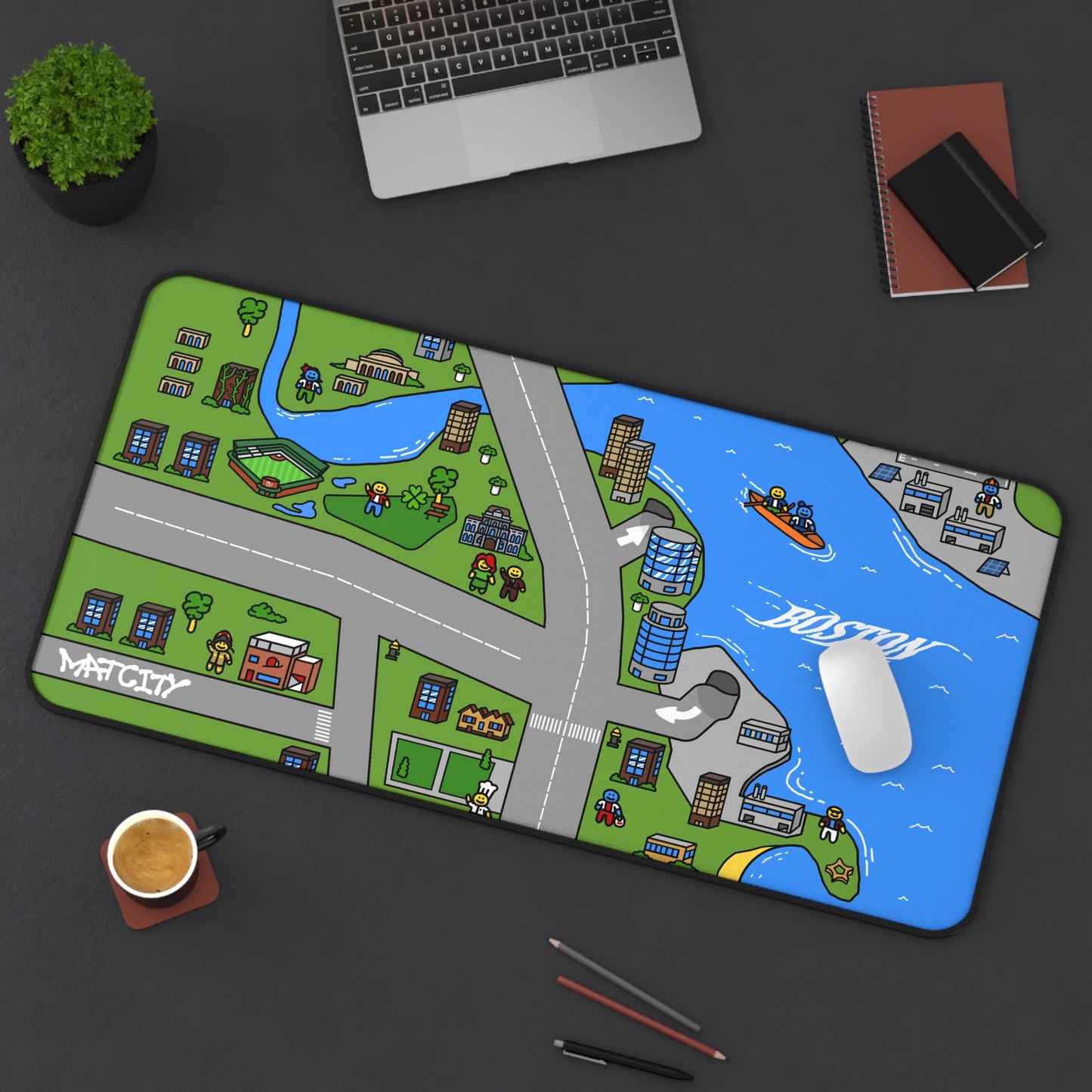 The Matcity Boston Mouse Mat Large placed on a desk with a laptop and mouse, highlighting the vibrant design and ample size.