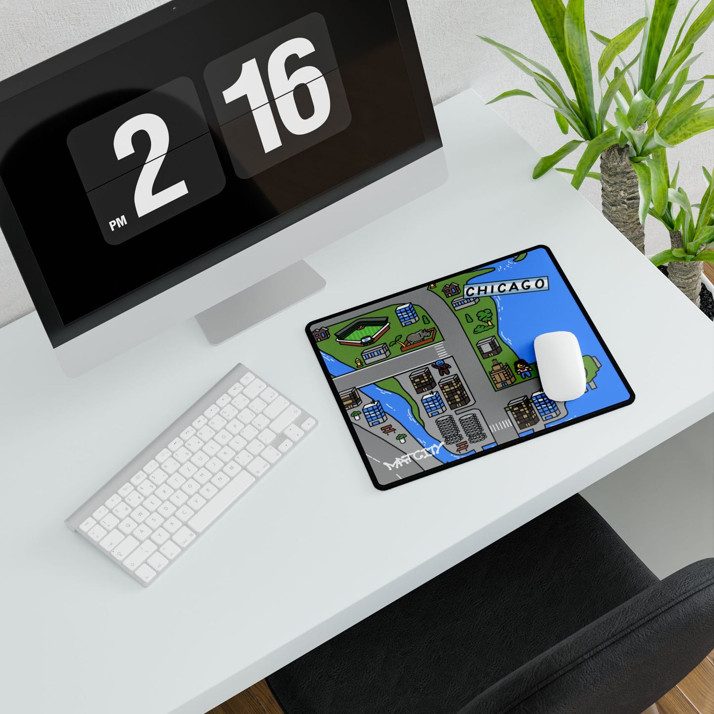 A compact Matcity Chicago mouse pad placed on a desk, featuring a section of the city’s skyline and streets.