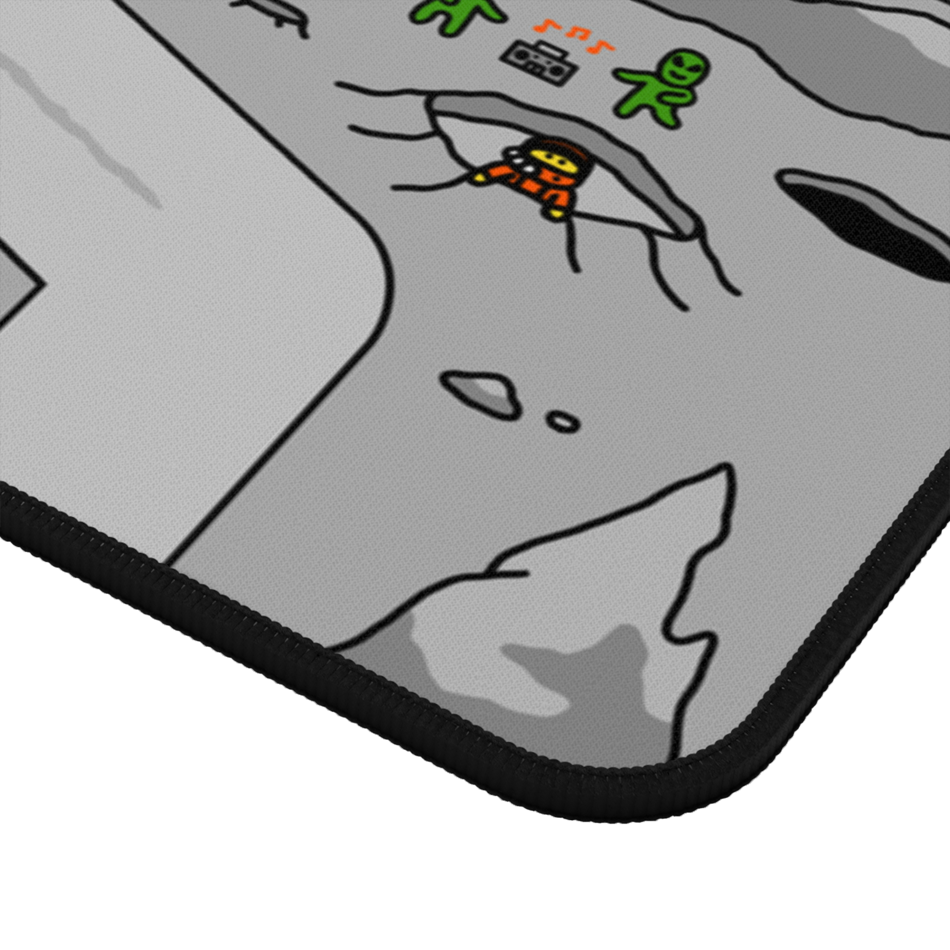 Close-up view of the Matcity Moon Mat Large corner, showing intricate stitching and a part of the cratered lunar surface with an astronaut and a green alien.