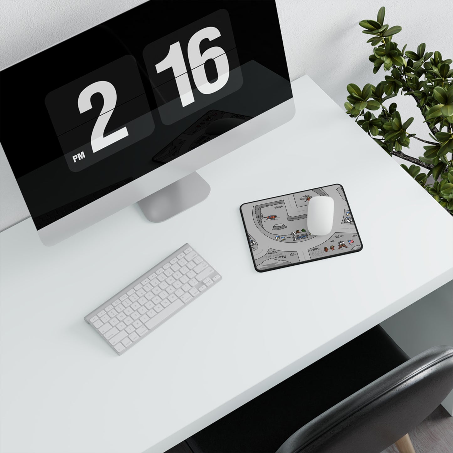 Matcity Mouse Mat Small arranged neatly in a workspace setting, placed next to a keyboard and monitor, showcasing its lunar design and clean surface.
