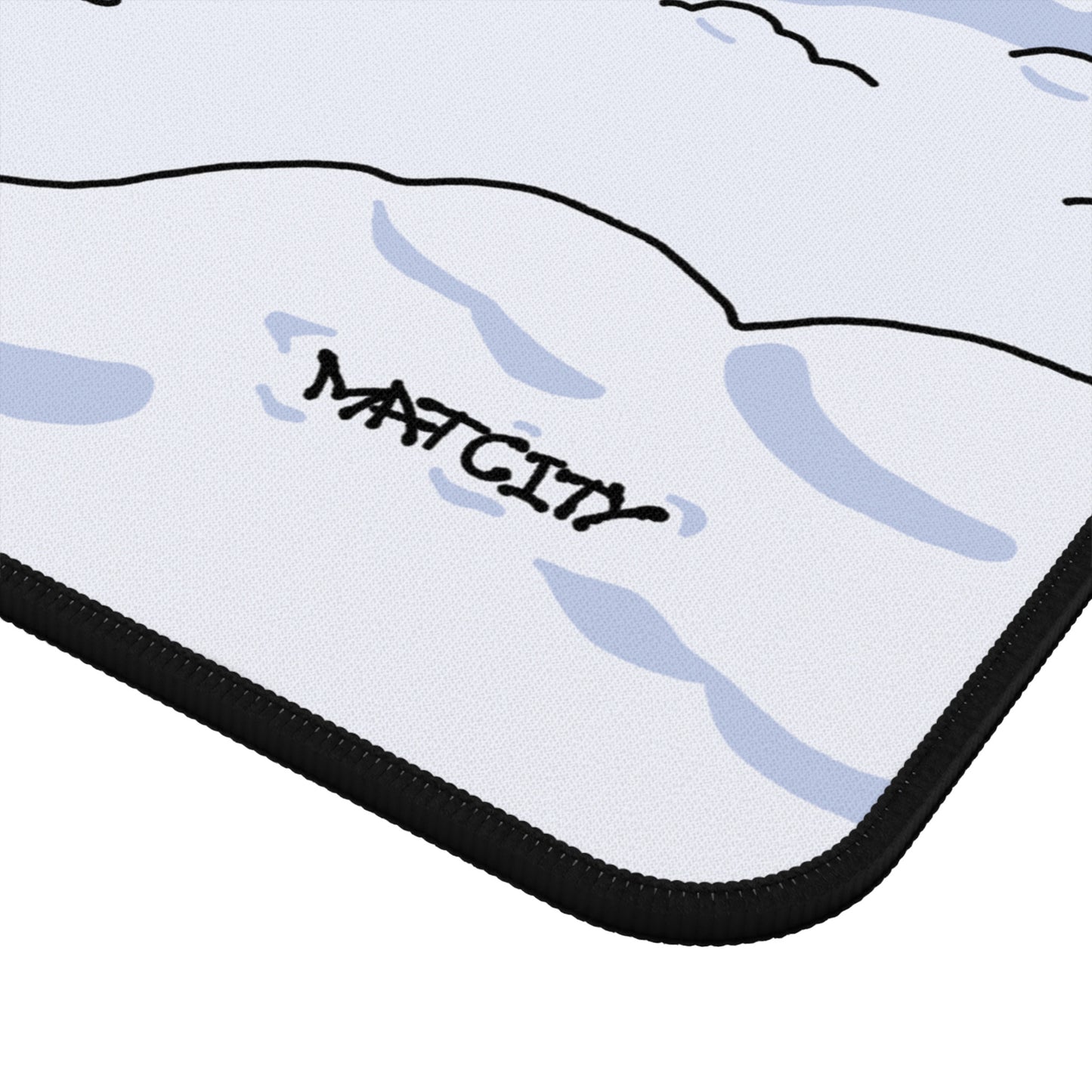 Close-up of the Matcity Snow Rally Mousepad's corner, highlighting detailed stitching and design.