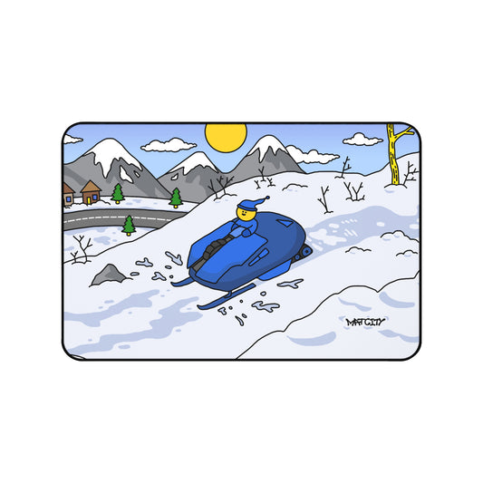 A snowy-themed Matcity Mousepad featuring a sled racer speeding down a slope with mountains and trees in the background.