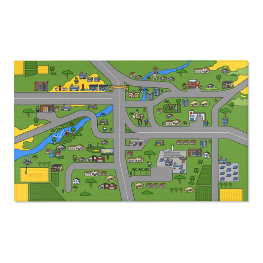 Rectangular play mat drawn as a colorful Bakersfield map—roads circle the gateway arch, farms, river, and houses sit on bright green fields.
