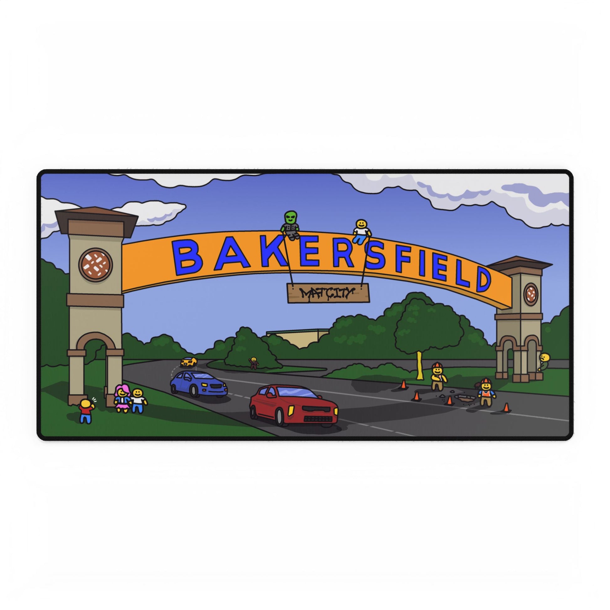 Wide desk‑pad illustration of Bakersfield’s iconic archway, two clock towers and rolling clouds above a road with red and blue cars, tiny construction workers, trees and Matcity tag.