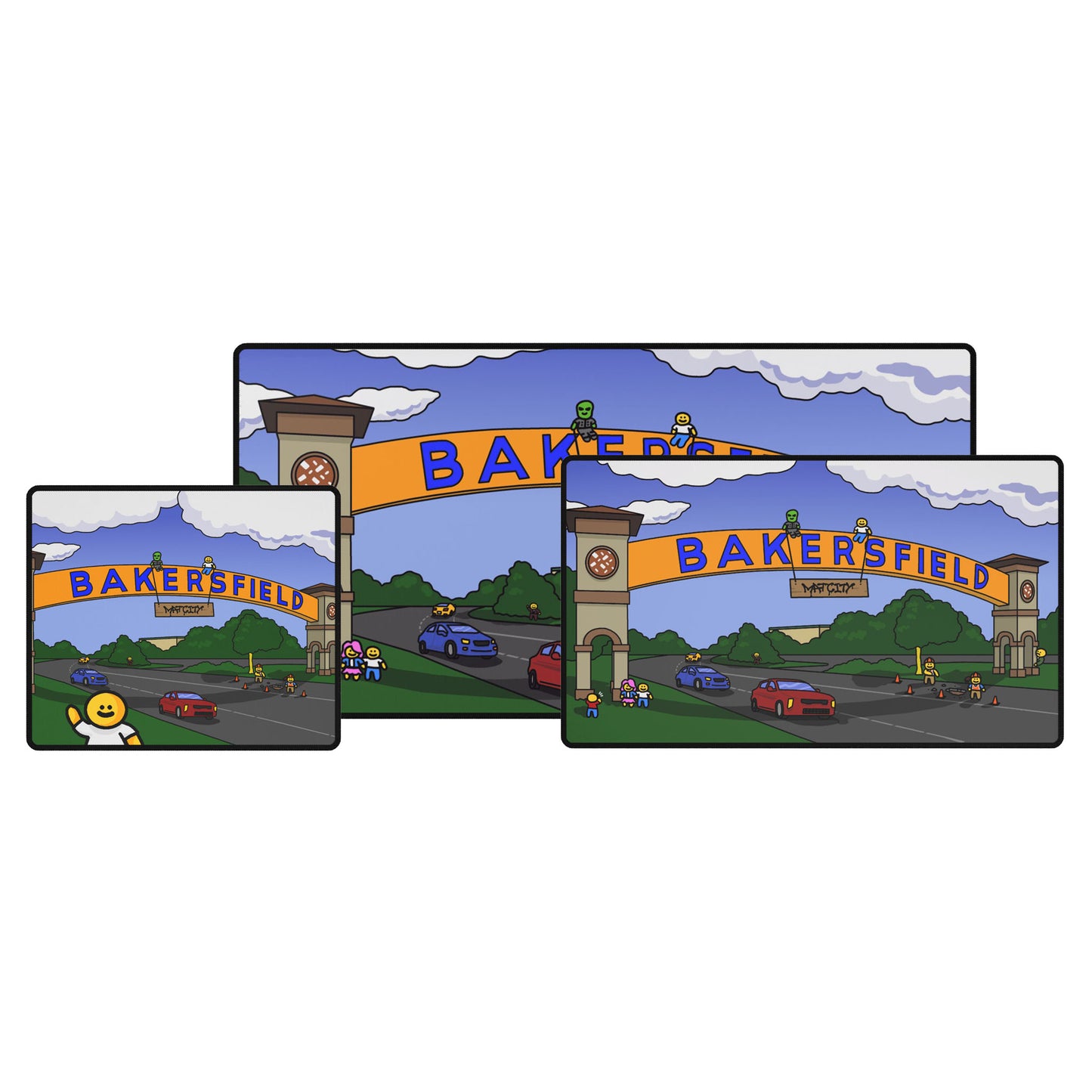 Three Matcity Bakersfield mouse pads—small, medium and large—overlap in a staggered stack. Each pad features the city’s yellow‑orange “BAKERSFIELD” arch, twin clock towers, cars on a winding road, cartoon figures and green hills under blue‑cloudy skies.