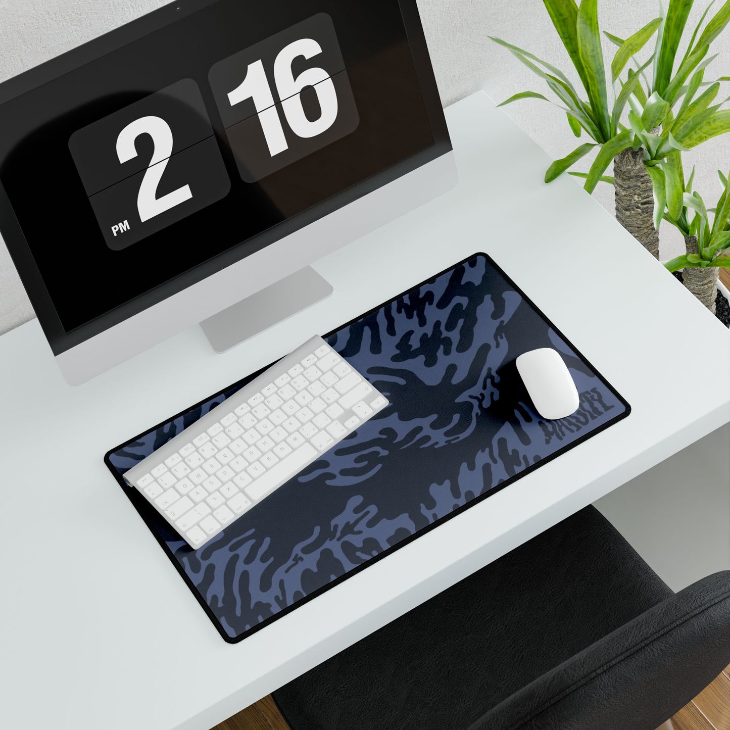 Desk setup with a medium Blue Tieger camouflage patterned mouse pad medium, computer monitor, keyboard, and mouse.