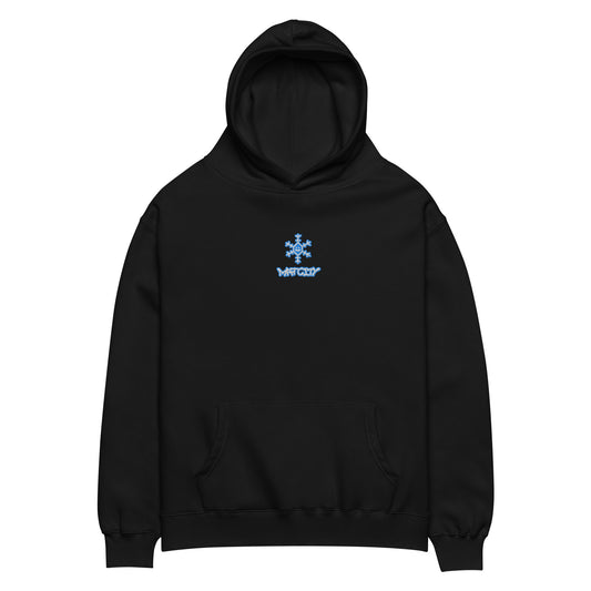 Black hoodie with light blue embroidered snowflake above Matcity graffiti logo centered on chest, hood up, laid flat on white background.