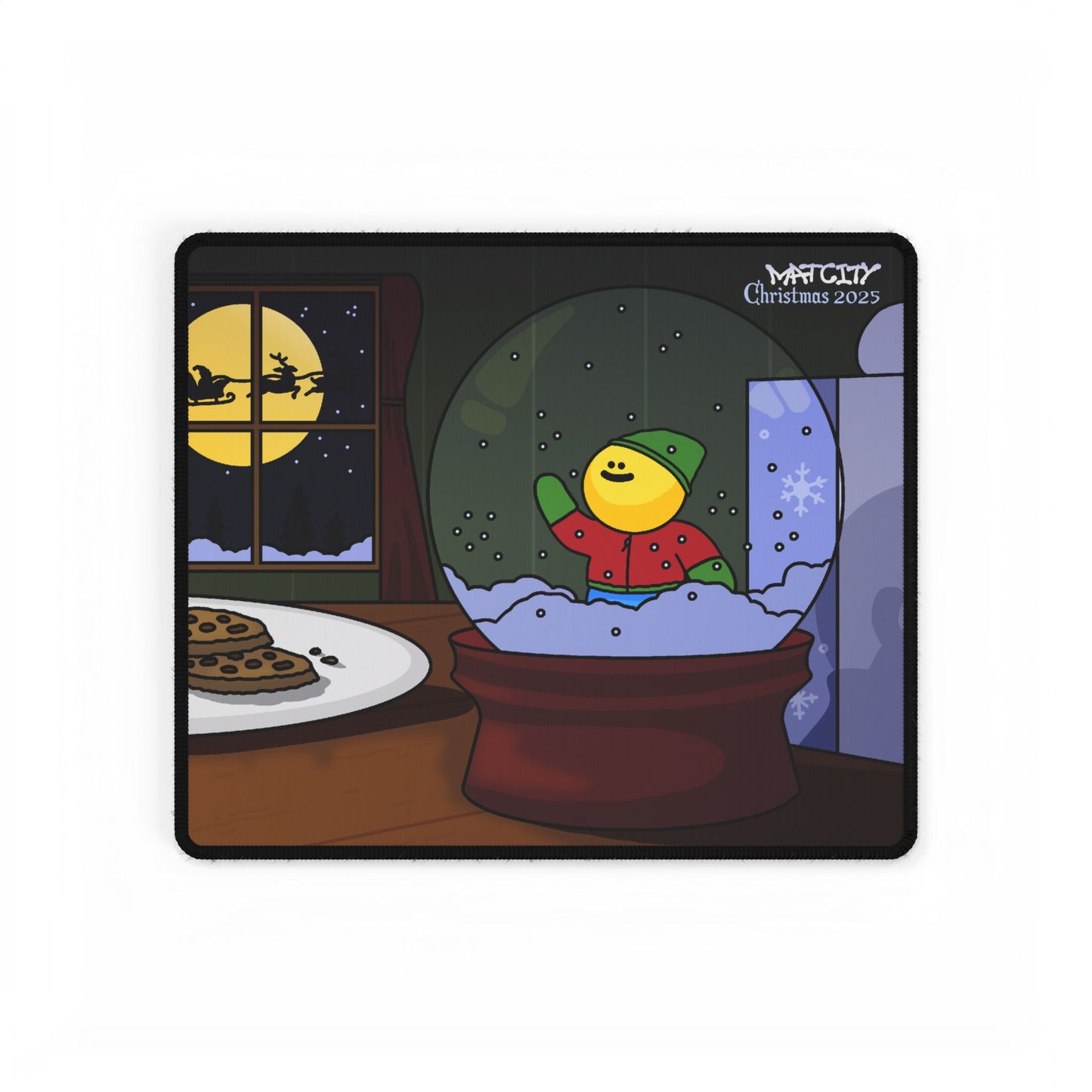 Small mouse pad, snow globe elf next to a cookie plate, with Santa’s sleigh silhouetted in the moon outside the window.