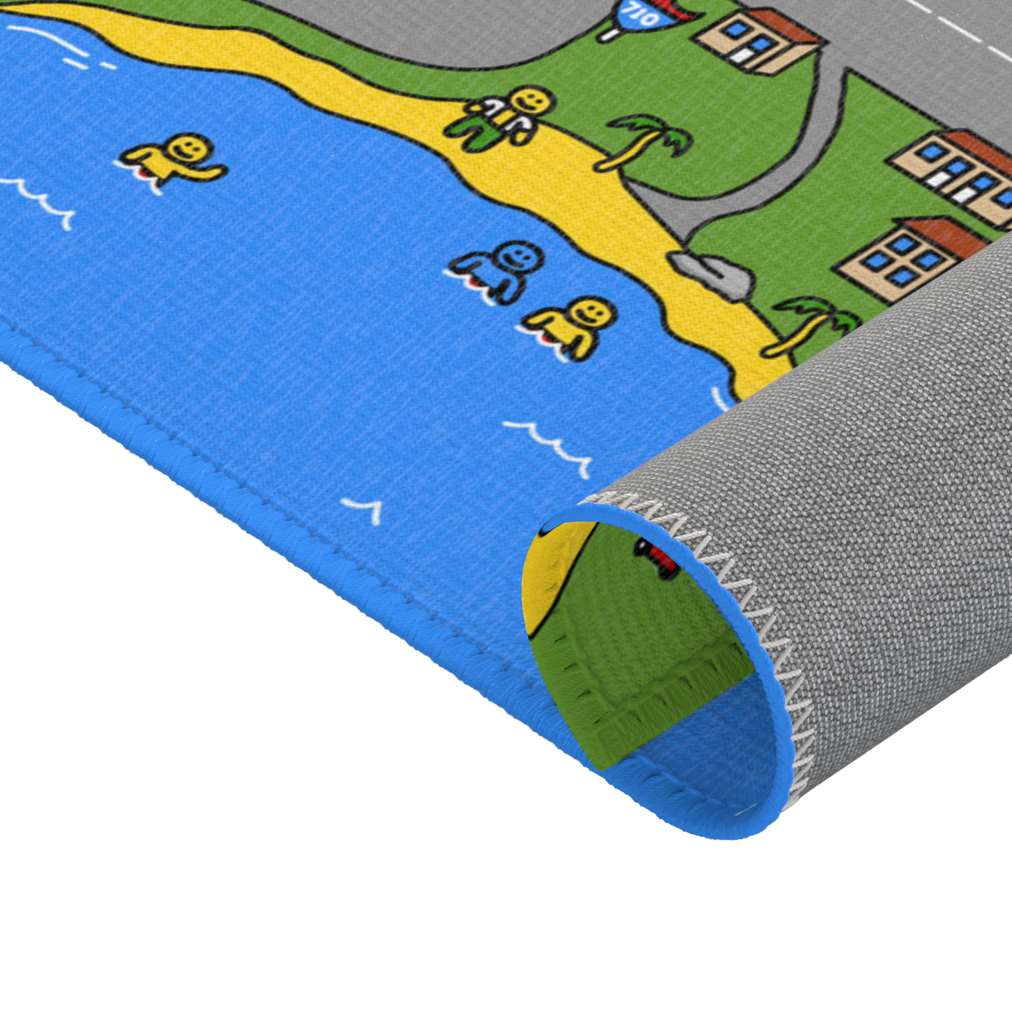 A close-up view of the Matcity Los Angeles mat rolled up, showing vibrant beach details with swimmers and palm trees.