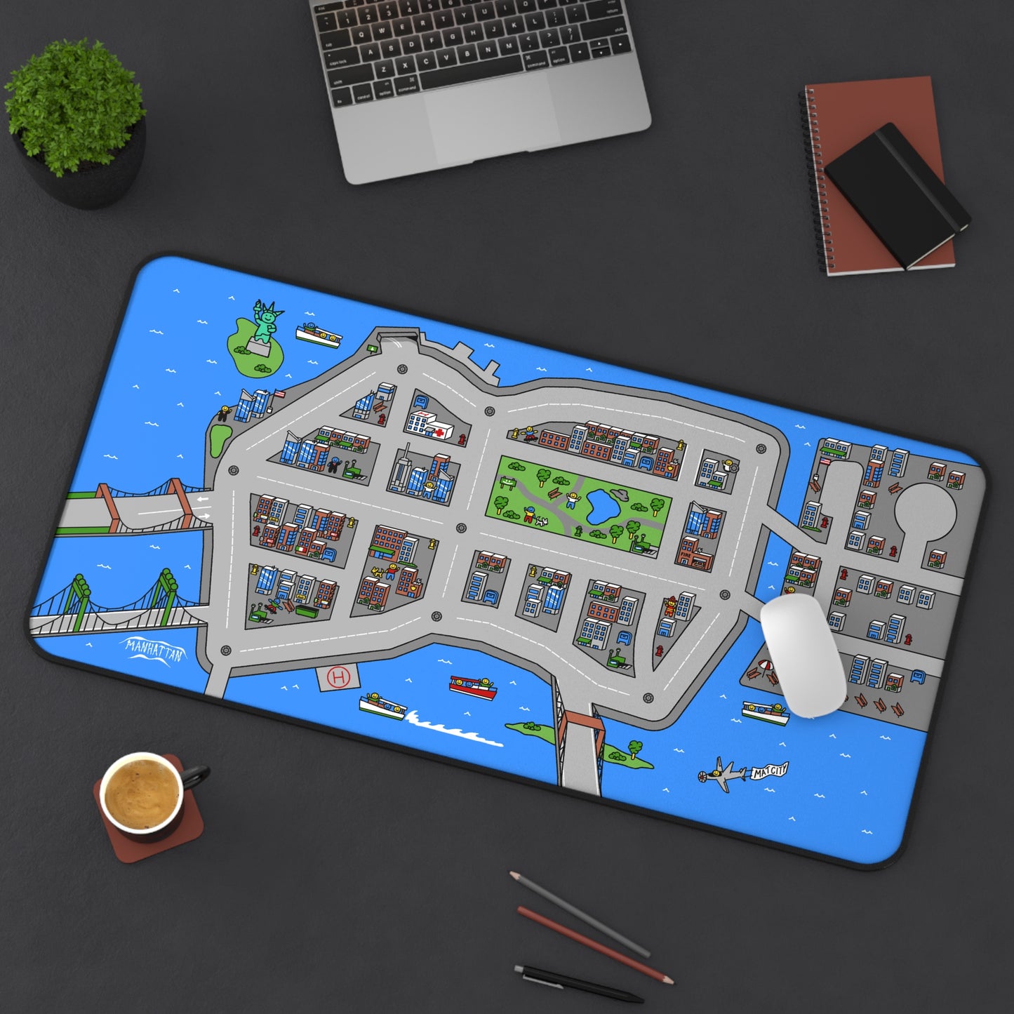 A workspace setup featuring the Matcity New York Mouse Mat Large under a laptop and mouse. The map design highlights bridges, parks, and New York-inspired architecture.