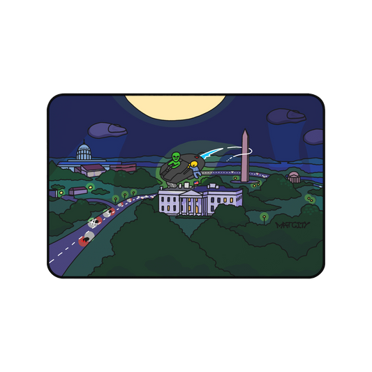 A medium-sized mouse mat featuring an illustrated alien scene over Washington DC, with the White House, Washington Monument, and UFOs under a glowing full moon.