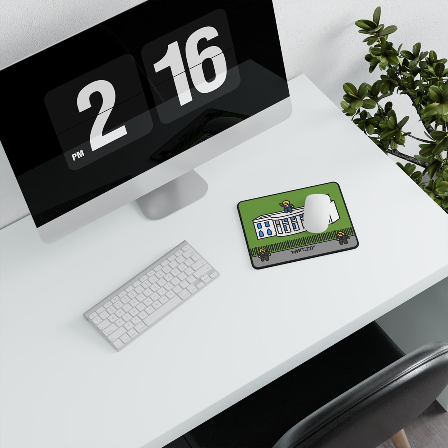 A stylish desk setup featuring the Washington DC Mouse Mat Small placed beside a desktop monitor and keyboard, offering a neat view of the White House.