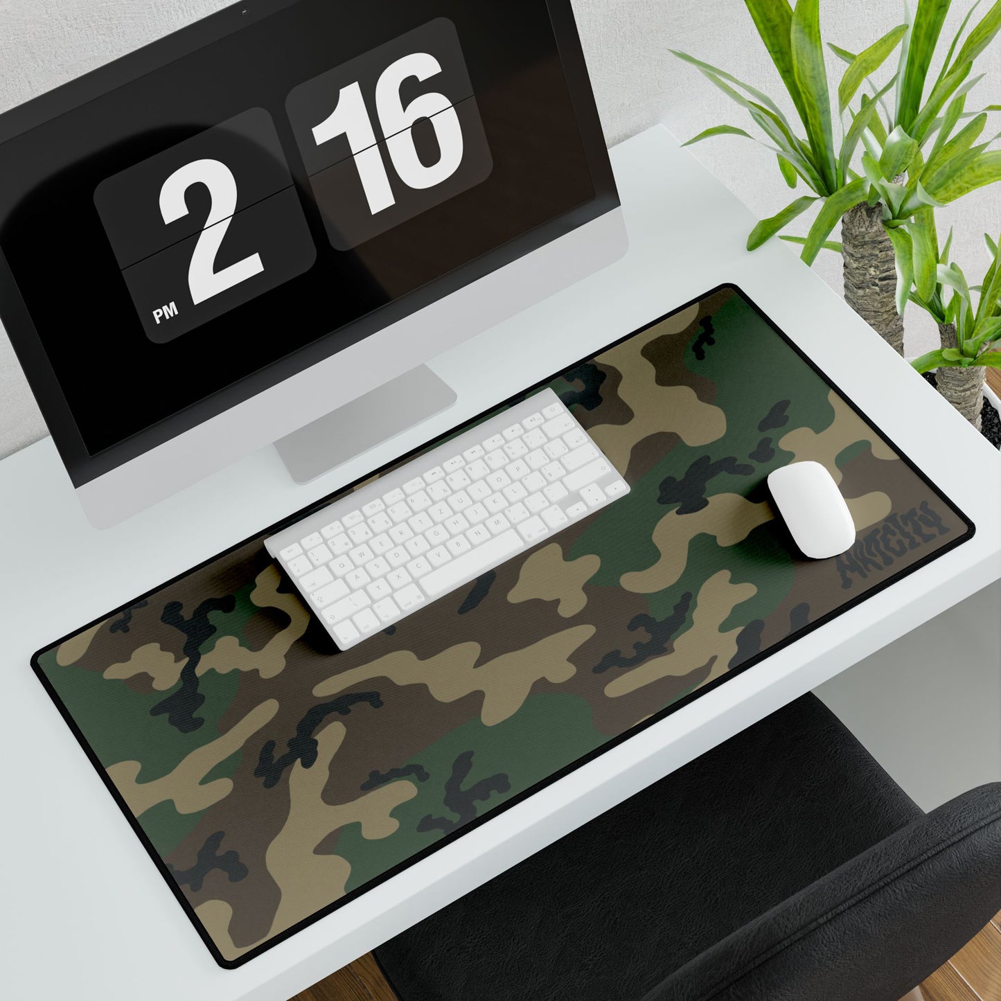 Woodland camouflage mouse pad on a desk with a computer, Keyboard and mouse.