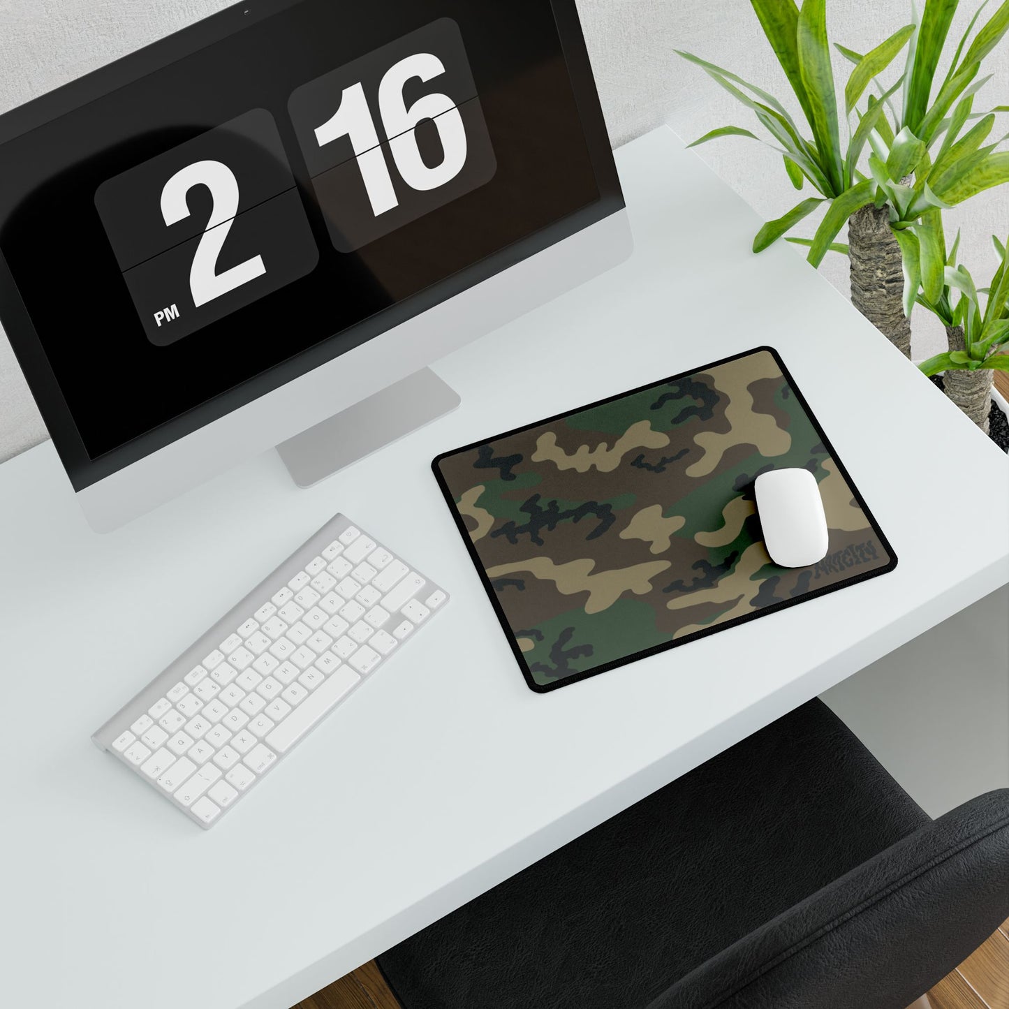 Woodland camouflage mouse pad on a desk with a computer, Keyboard and mouse.