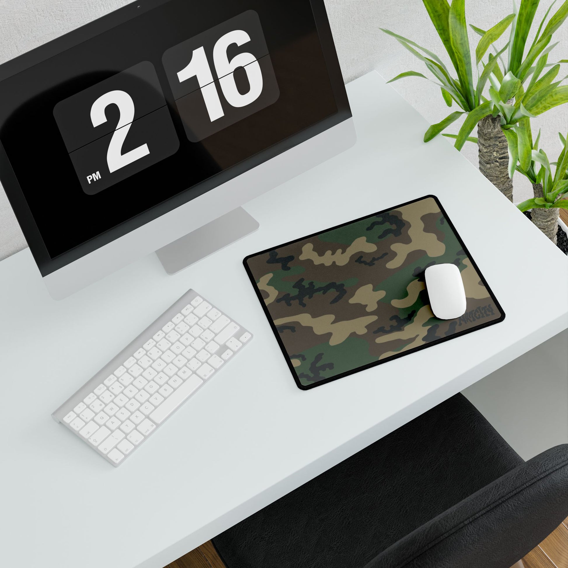 Woodland camouflage mouse pad on a desk with a computer, Keyboard and mouse.